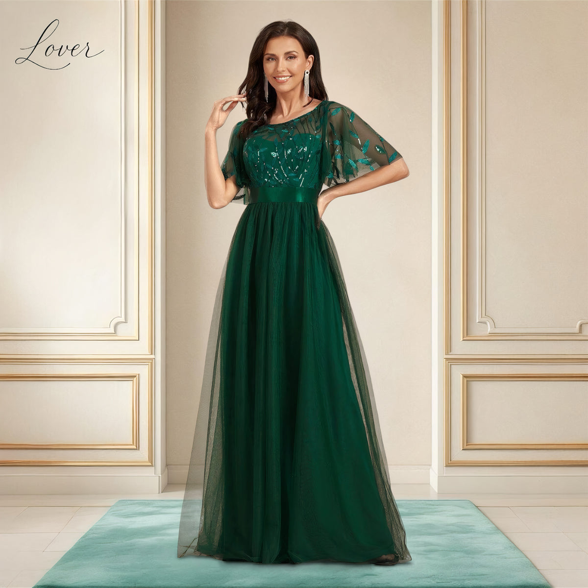 Vestido verde esmeralda con lentejuelas y mangas de tul