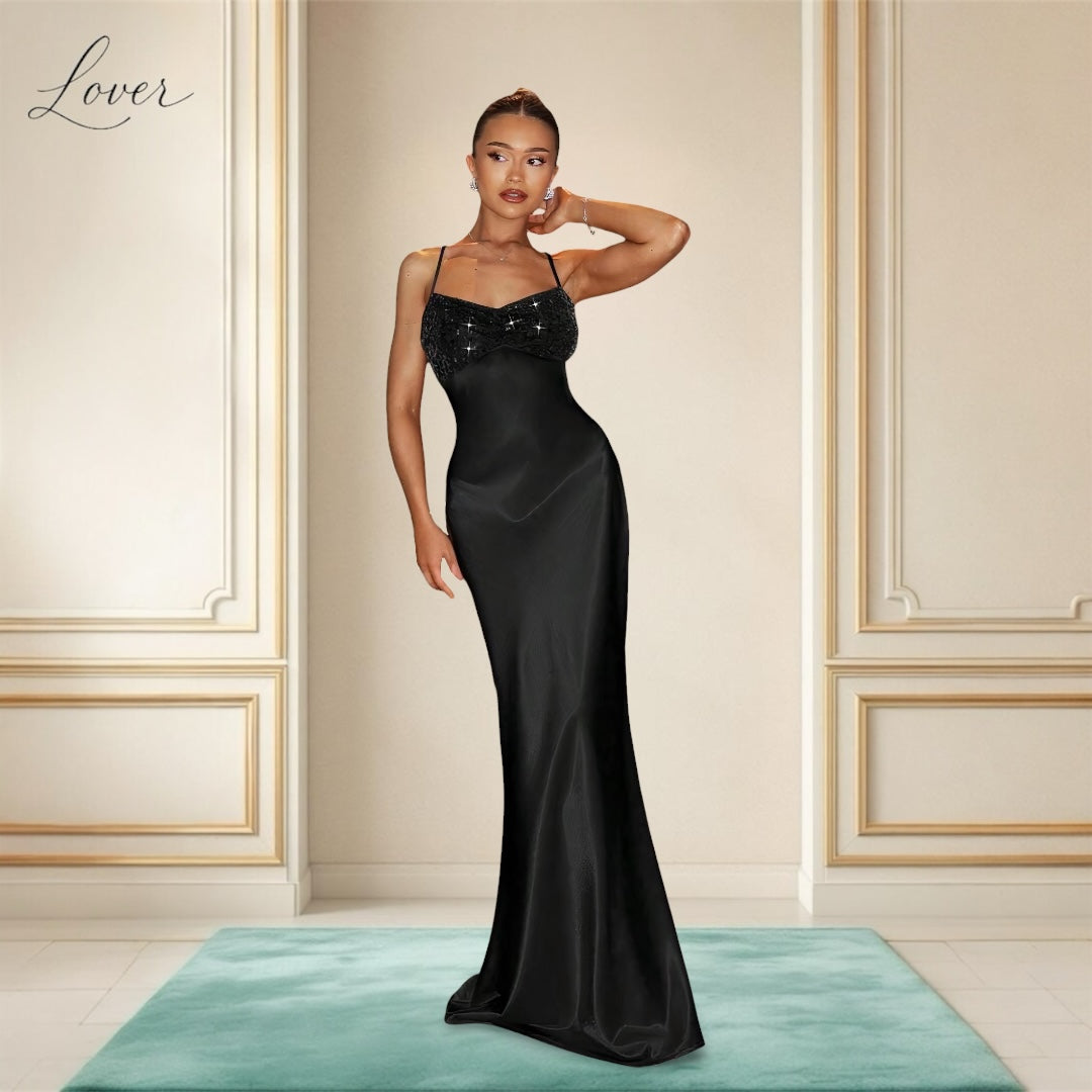 Vestido negro de lentejuelas en top