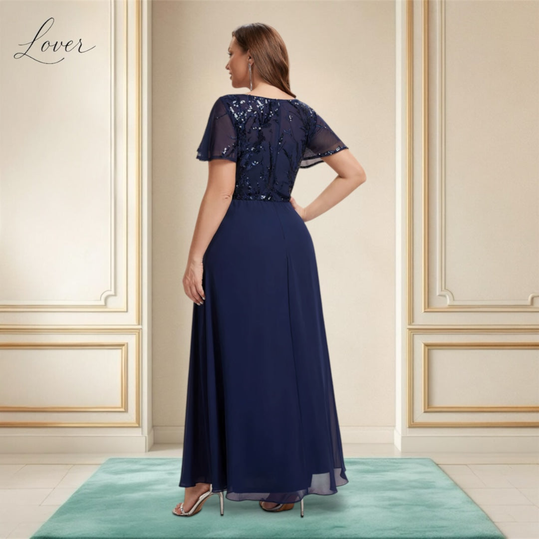 Vestido azul navy de encaje y lentejuelas con manga