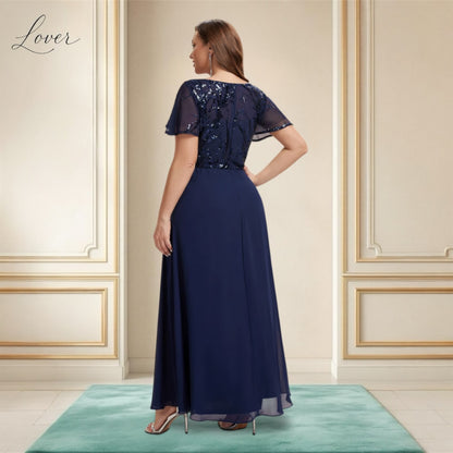 Vestido azul navy de encaje y lentejuelas con manga