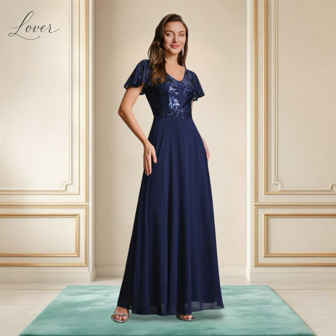 Vestido azul navy de encaje y lentejuelas con manga