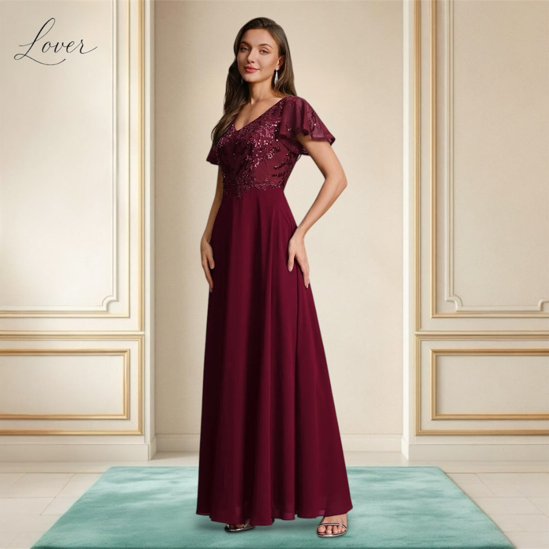 Vestido vino de encaje y lentejuelas con manga