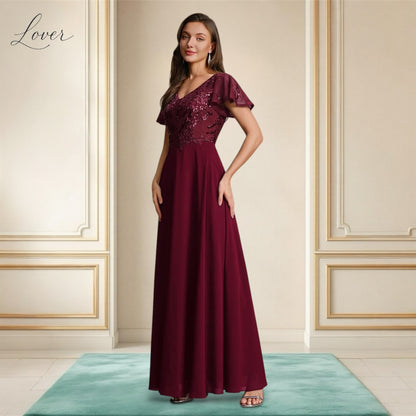 Vestido vino de encaje y lentejuelas con manga
