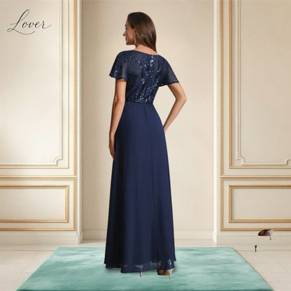 Vestido azul navy de encaje y lentejuelas con manga