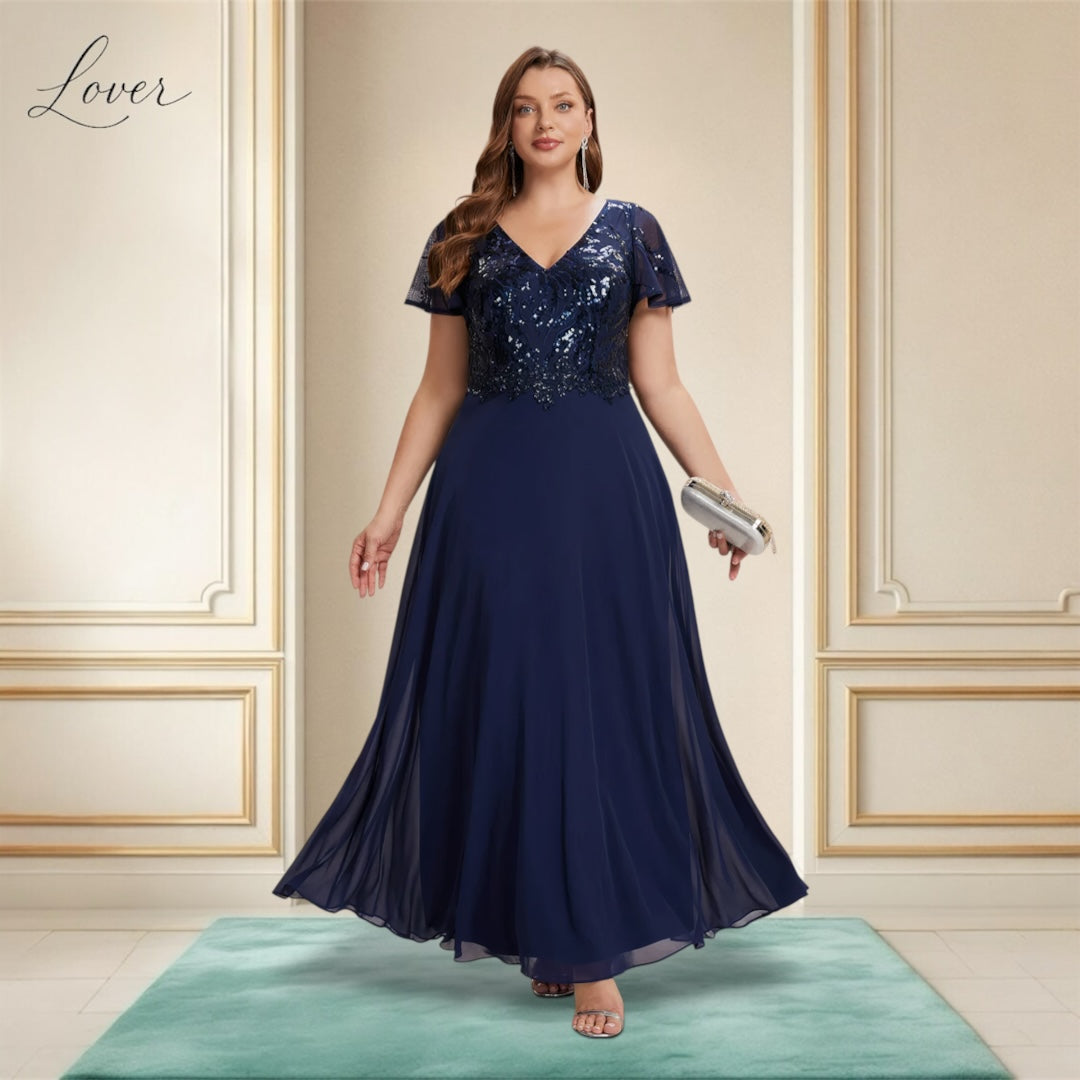 Vestido azul navy de encaje y lentejuelas con manga