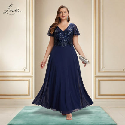 Vestido azul navy de encaje y lentejuelas con manga