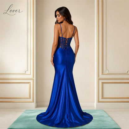 Vestido azul al cuerpo con flores en top