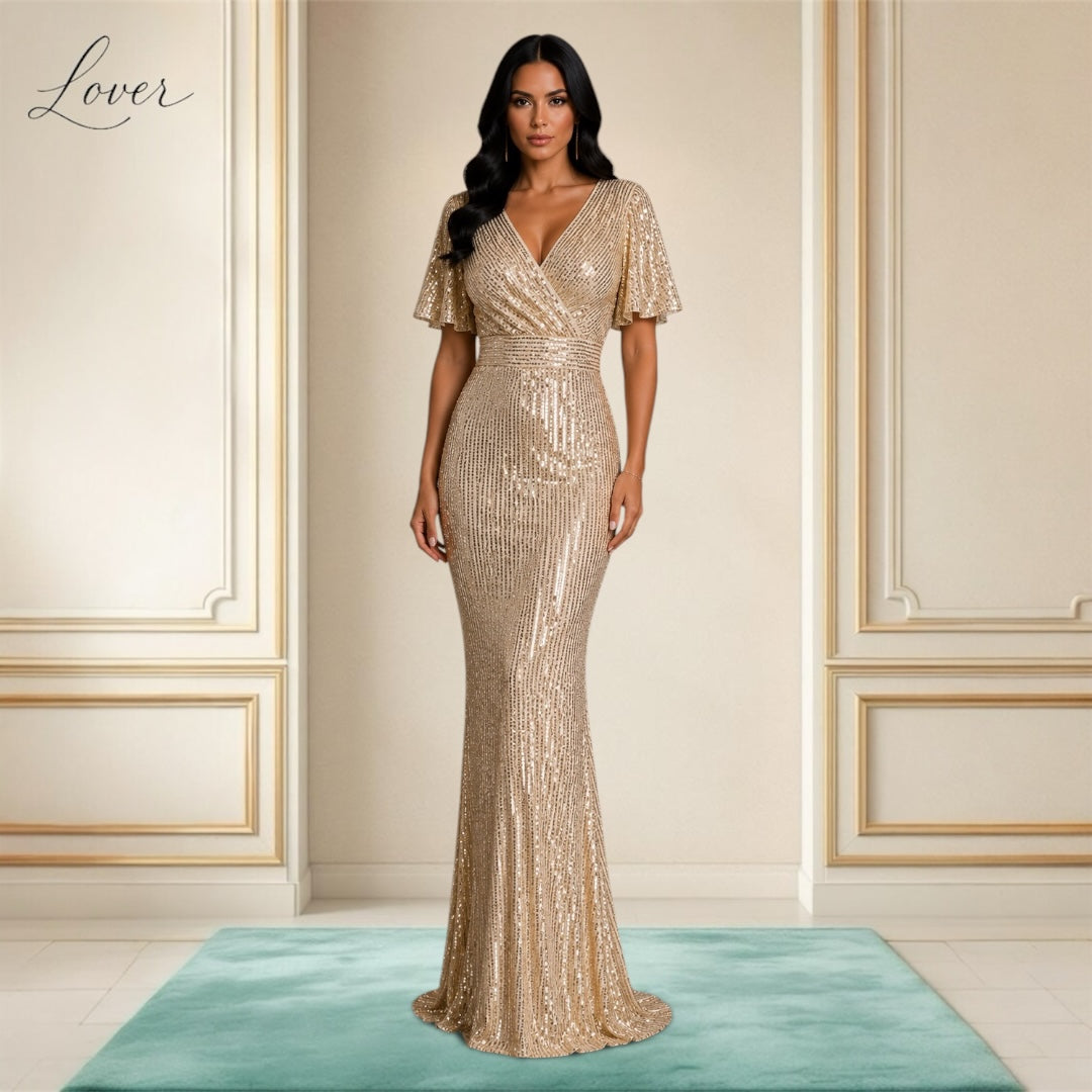 Vestido dorado al cuerpo de lentejuelas