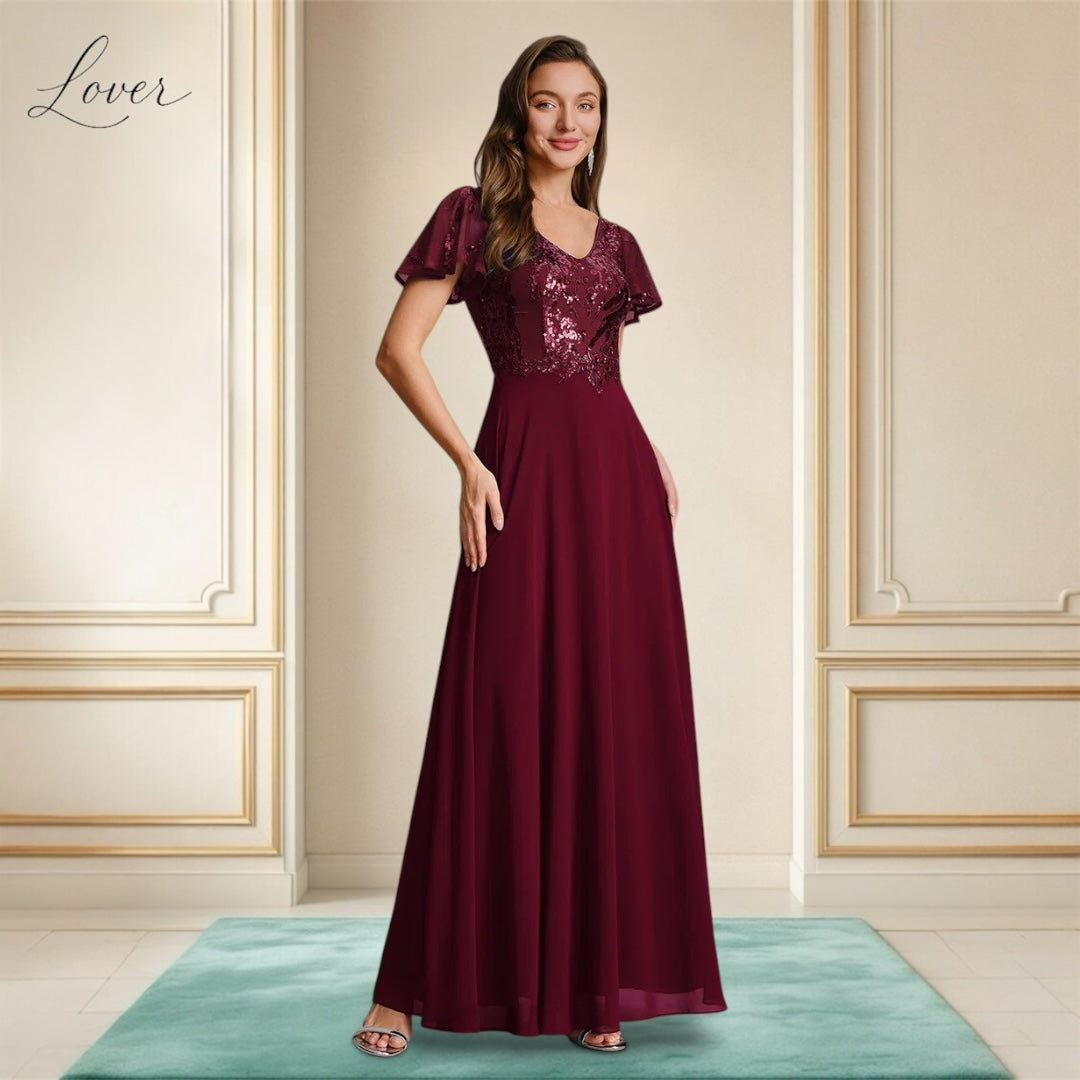 Vestido vino de encaje y lentejuelas con manga