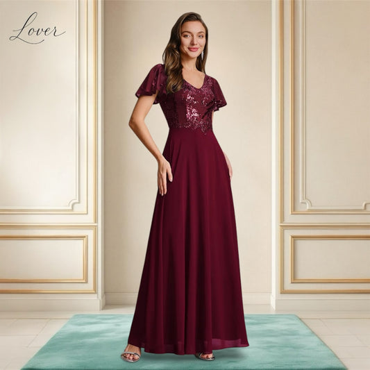 Vestido vino de encaje y lentejuelas con manga