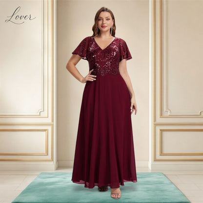 Vestido vino de encaje y lentejuelas con manga