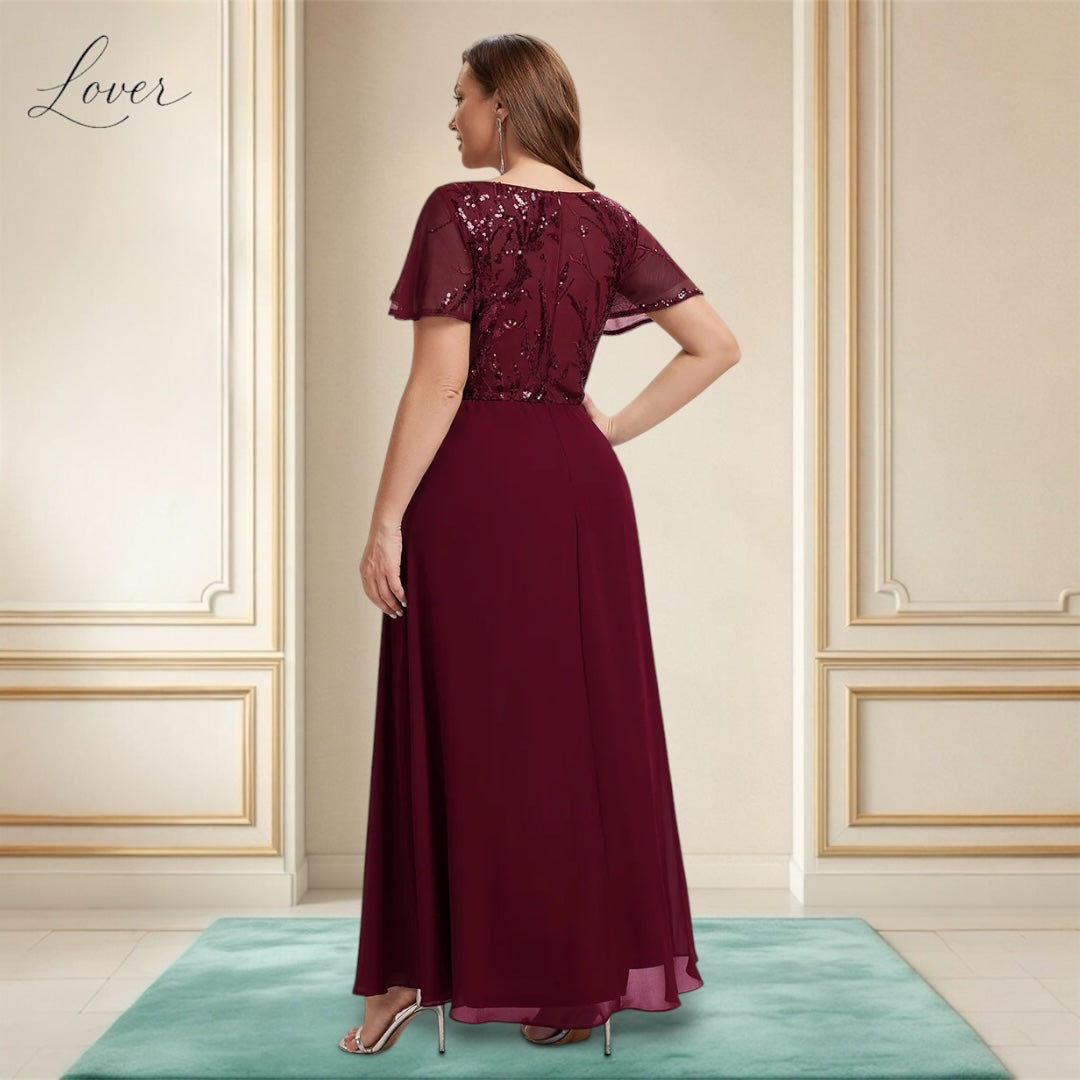Vestido vino de encaje y lentejuelas con manga