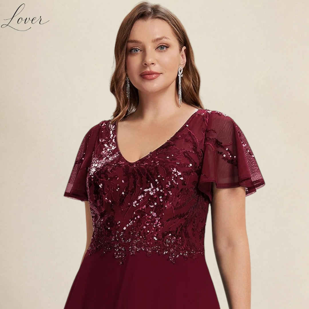 Vestido vino de encaje y lentejuelas con manga
