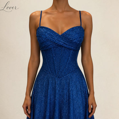 Vestido azul navy de brillos con drapeado cruzado