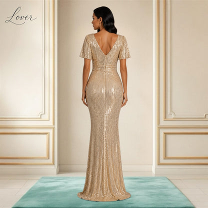 Vestido dorado al cuerpo de lentejuelas