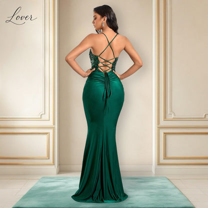 Vestido verde esmeralda con lentejuelas en top