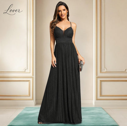 Vestido negro plisado con brillos