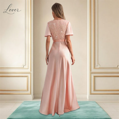 Vestido blush con lentejuelas en top