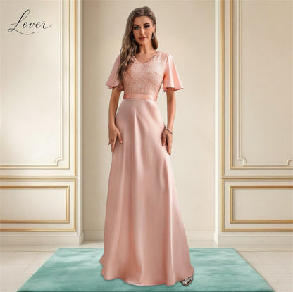 Vestido blush con lentejuelas en top