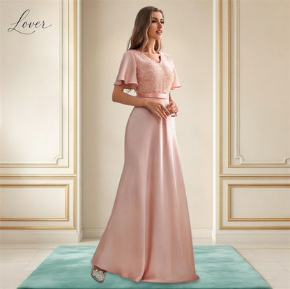 Vestido blush con lentejuelas en top