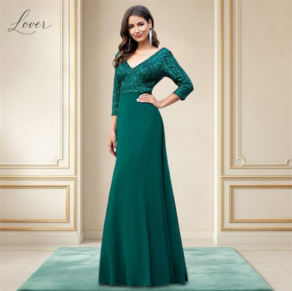 Vestido verde esmeralda de manga larga con lentejuelas en top
