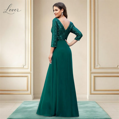 Vestido verde esmeralda de manga larga con lentejuelas en top