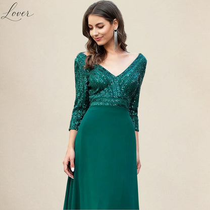 Vestido verde esmeralda de manga larga con lentejuelas en top
