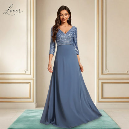 Vestido dusty blue de manga larga con lentejuelas en top