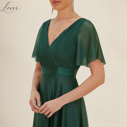 Vestido verde esmeralda con brillos de manga corta