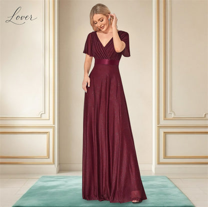 Vestido vino con brillos de manga corta