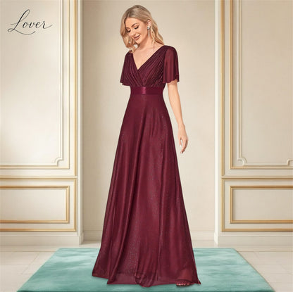 Vestido vino con brillos de manga corta