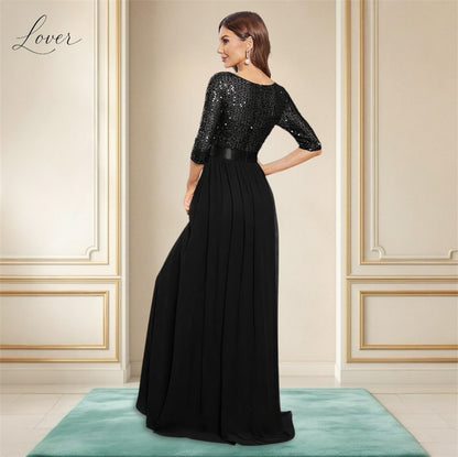 Vestido negro de manga larga con lentejuelas