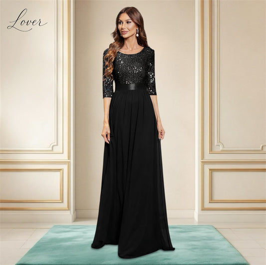 Vestido negro de manga larga con lentejuelas