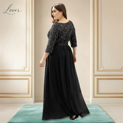 Vestido negro de manga larga con lentejuelas