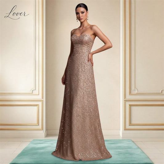 Vestido oro rosa de brillos strapless