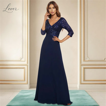 Vestido azul de manga larga con lentejuelas en top