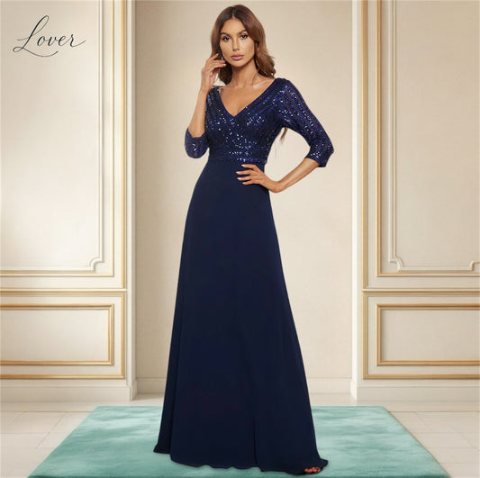 Vestido azul de manga larga con lentejuelas en top