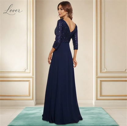 Vestido azul de manga larga con lentejuelas en top