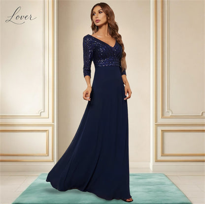 Vestido azul de manga larga con lentejuelas en top