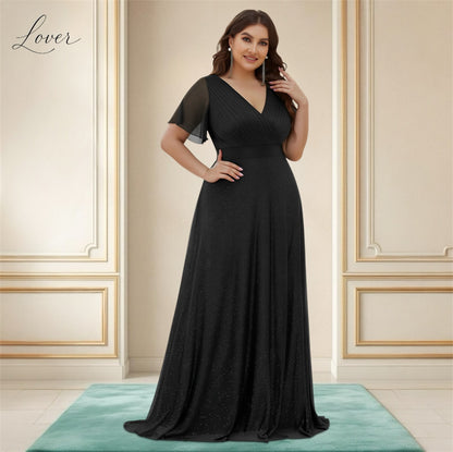 Vestido negro de brillos con manga