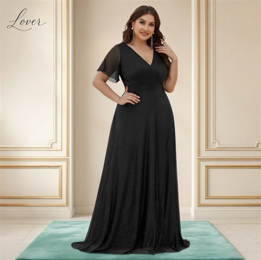 Vestido negro de brillos con manga