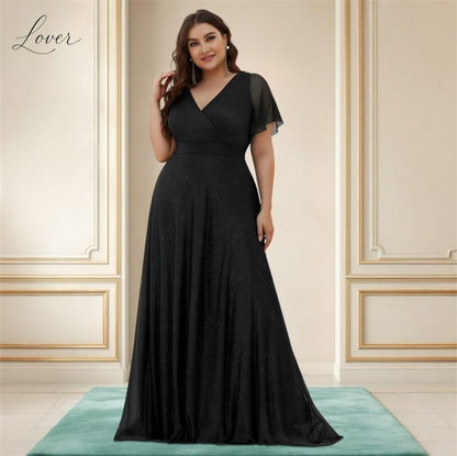 Vestido negro de brillos con manga