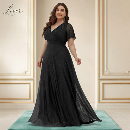 Vestido negro de brillos con manga
