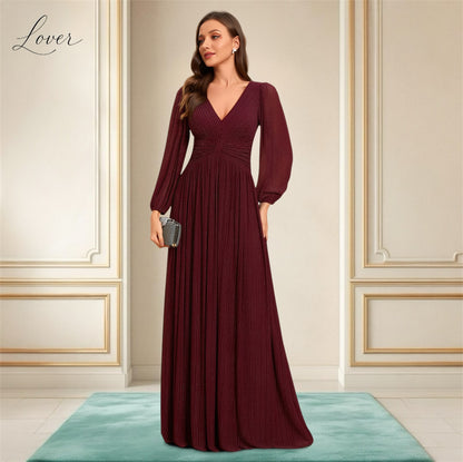 Vestido vino de manga larga con brillos