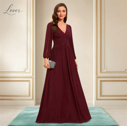 Vestido vino de manga larga con brillos
