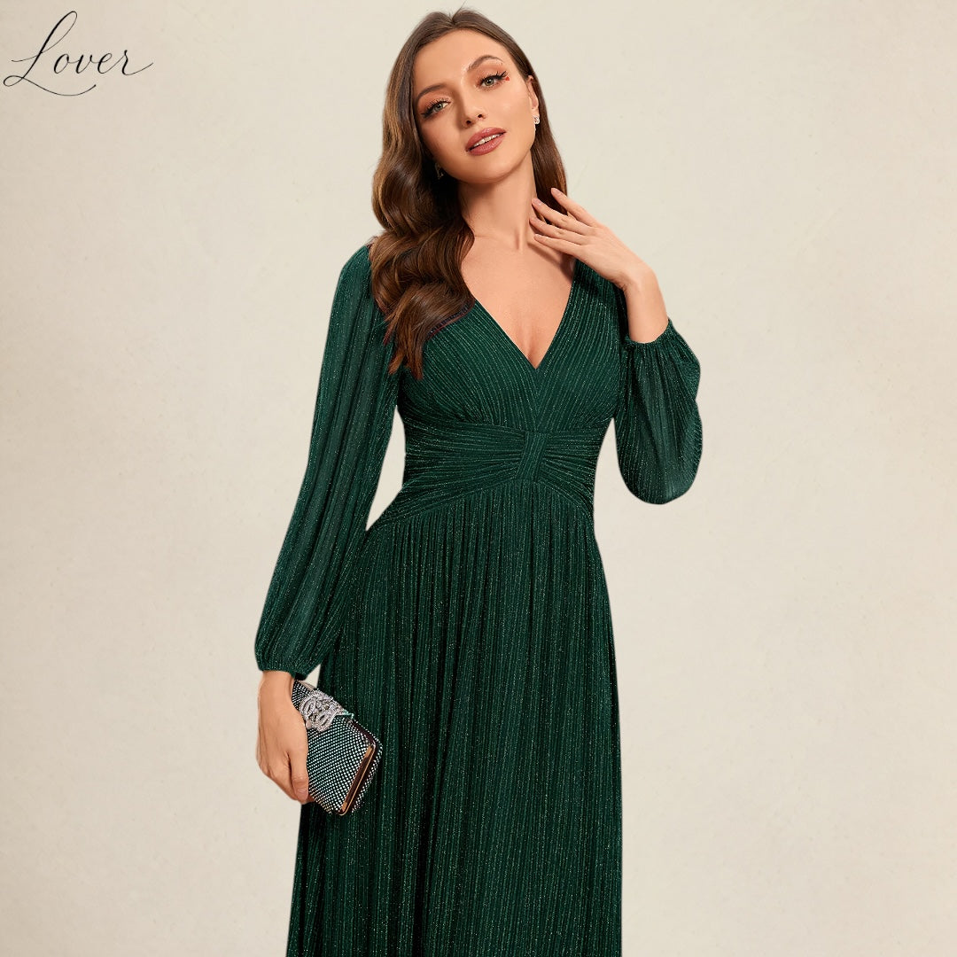 Vestido verde esmeralda de manga larga con brillos