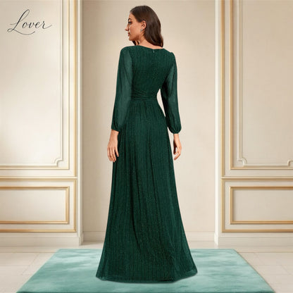 Vestido verde esmeralda de manga larga con brillos