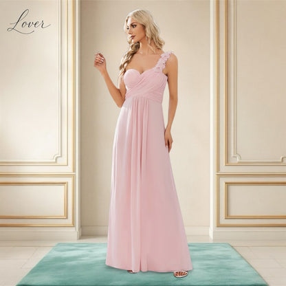 Vestido rosa con tirante de flores