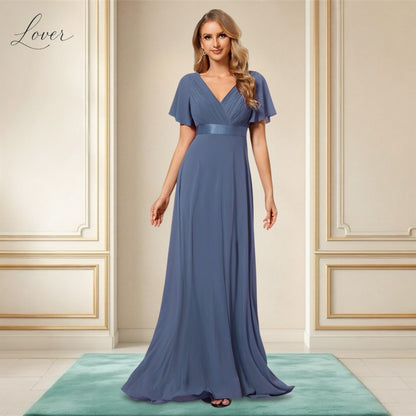 Vestido dusty blue con escote en V y mangas